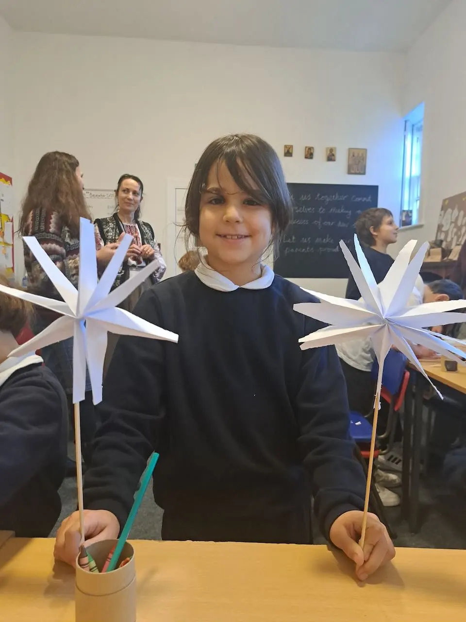 Child holding craft